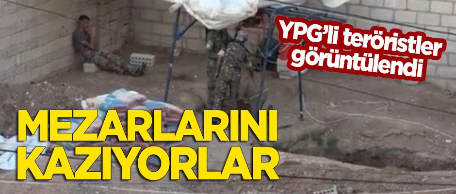YPG'li teröristler mezarlarını kazarken görüntülendi