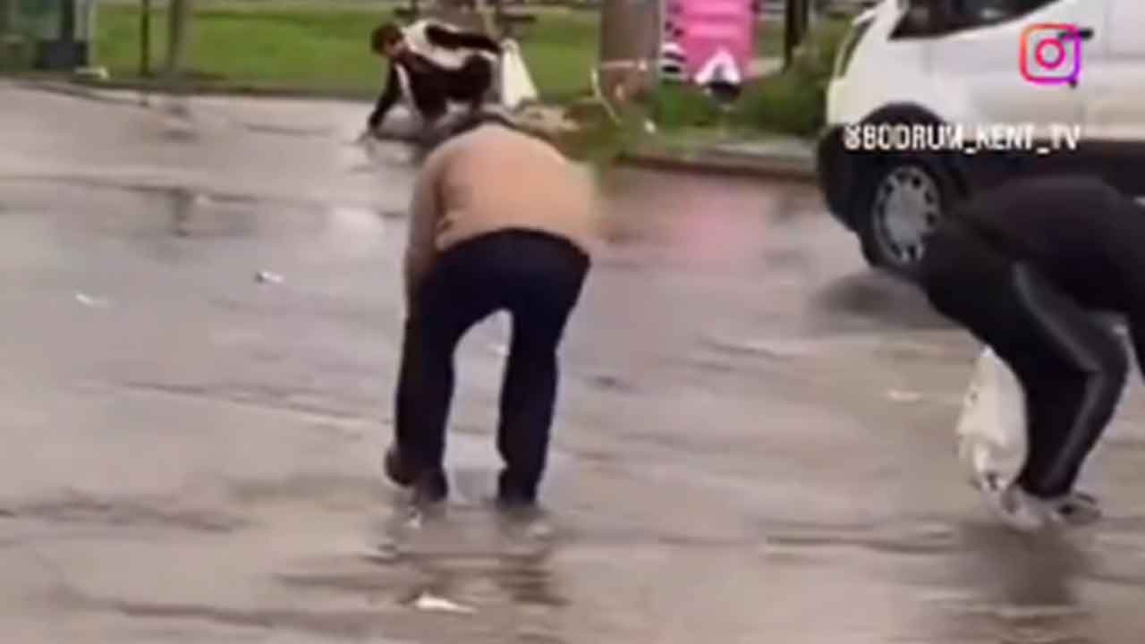 CHP'li belediyeden hizmet gibi hizmet (!) Vatandaşlar yollardan poşet poşet balık topladı