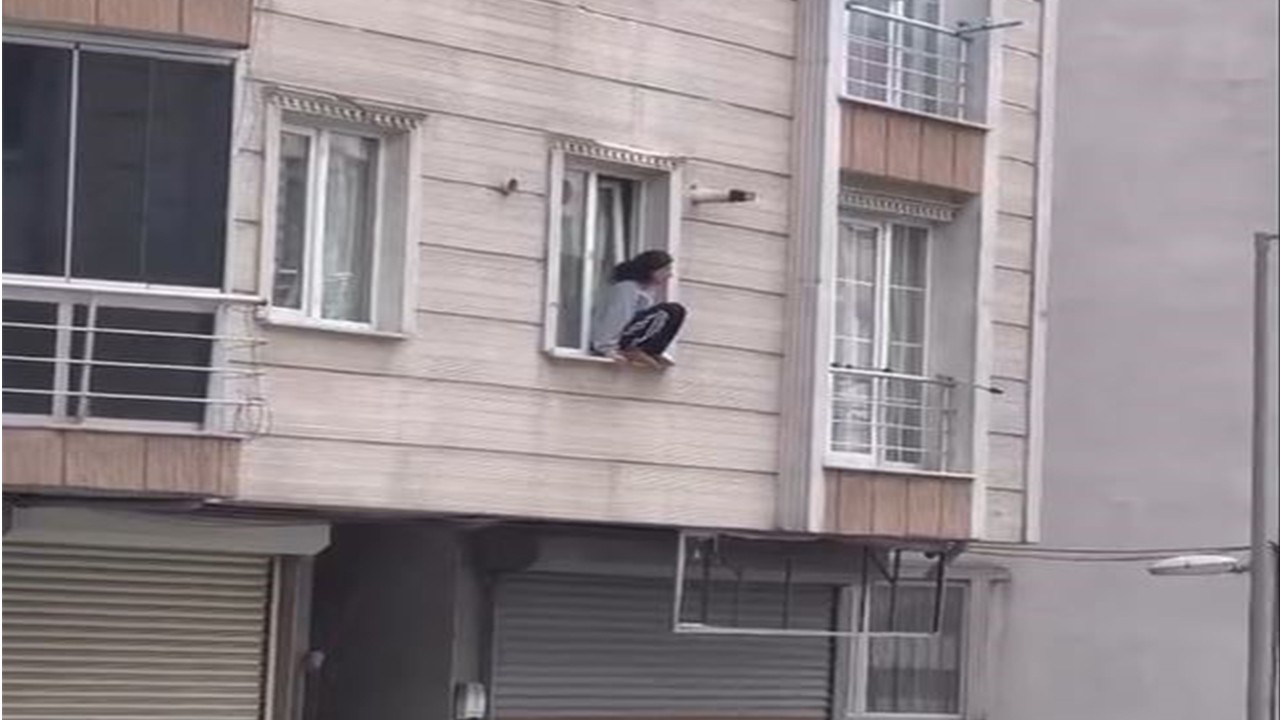 Kocası tarafından eve kitlenen genç kadın kendini camdan attı