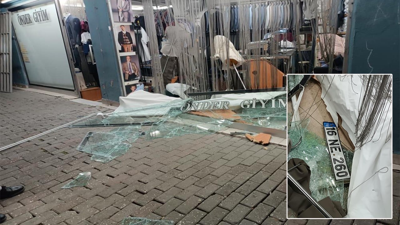 Otomobille dükkana girdi, korkup firar etti